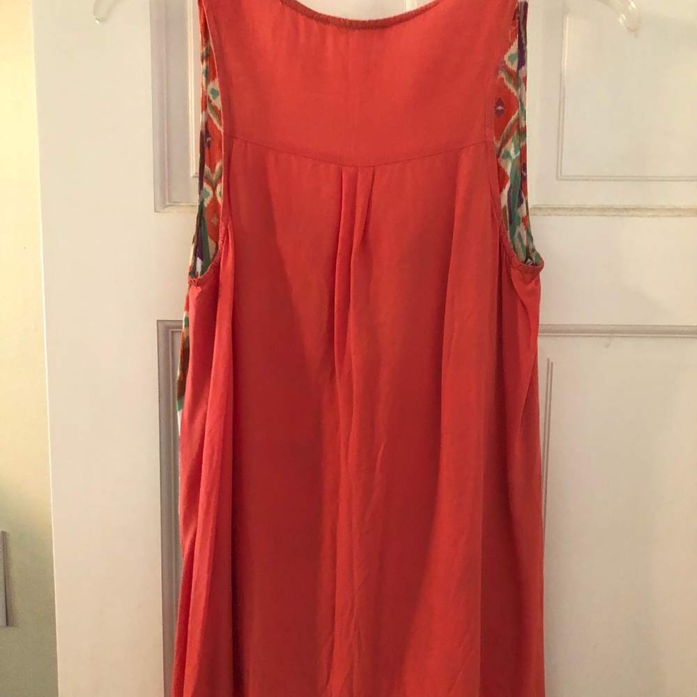 Hi-low button front tank
